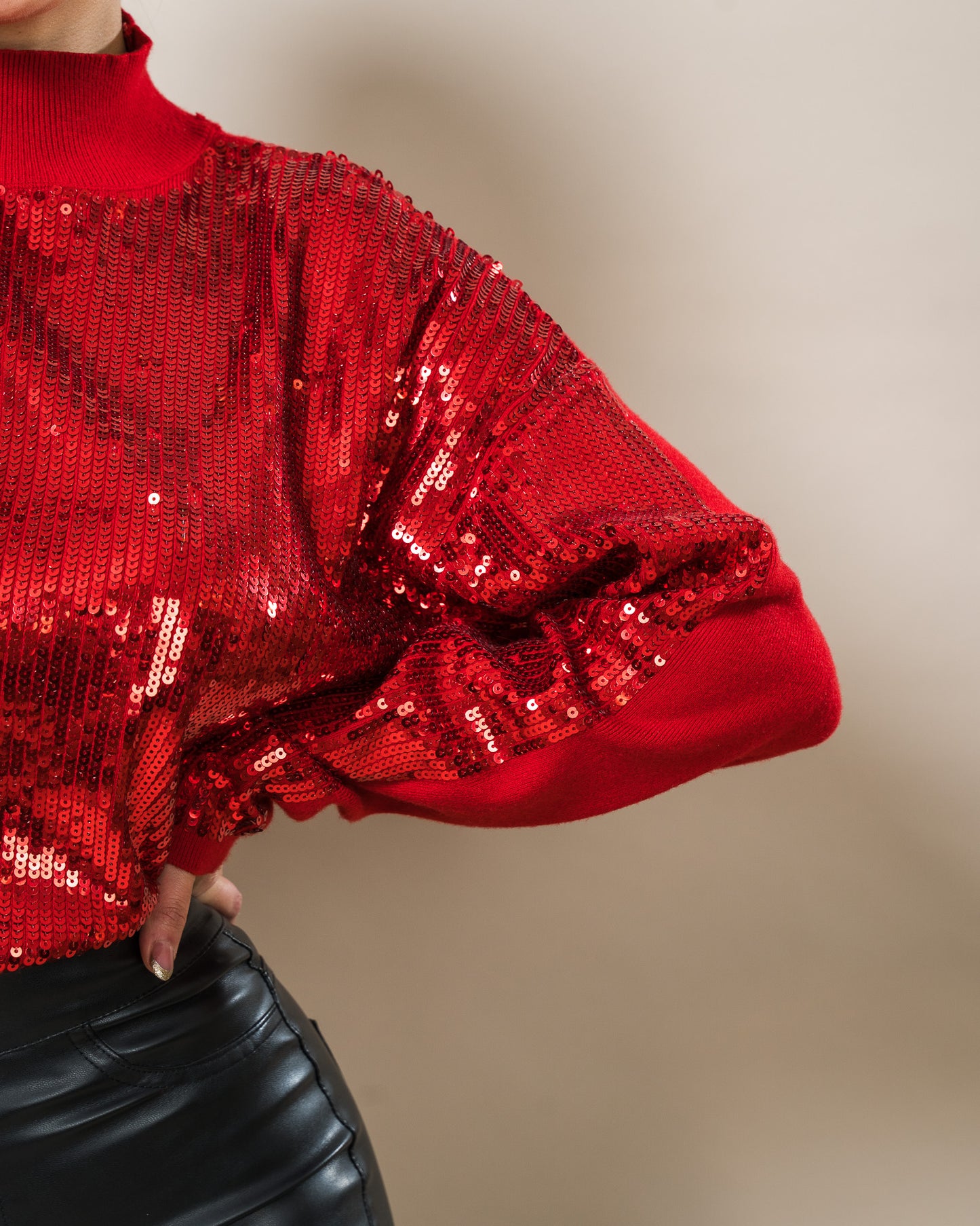 SUÉTER DE PUNTO CON APLICACIONES DE LENTEJUELA